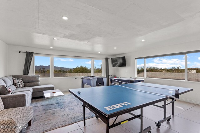 1061 W Roller Coaster Rd, Tucson, AZ 85704 - playroom featuring recessed lighting, baseboards, and light tile patterned flooring
