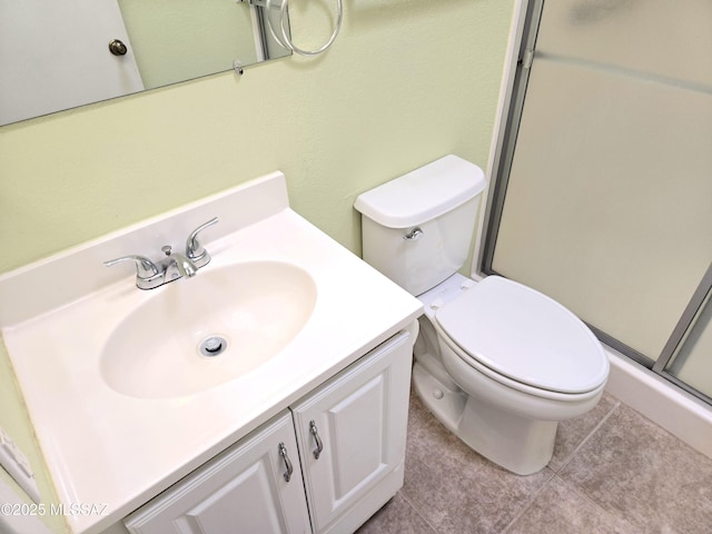 290 N Paseo De Los Conquistadores, Green Valley, AZ 85614 - full bath with vanity, a stall shower, toilet, and tile patterned floors