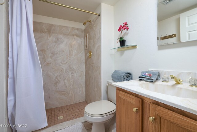 full bath with a shower with shower curtain, vanity, toilet, and tile patterned floors