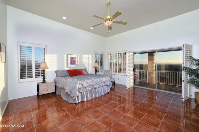 bedroom featuring a towering ceiling, ceiling fan, access to exterior, tile patterned flooring, and recessed lighting