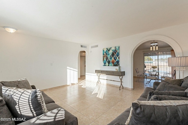 living room with light tile patterned floors