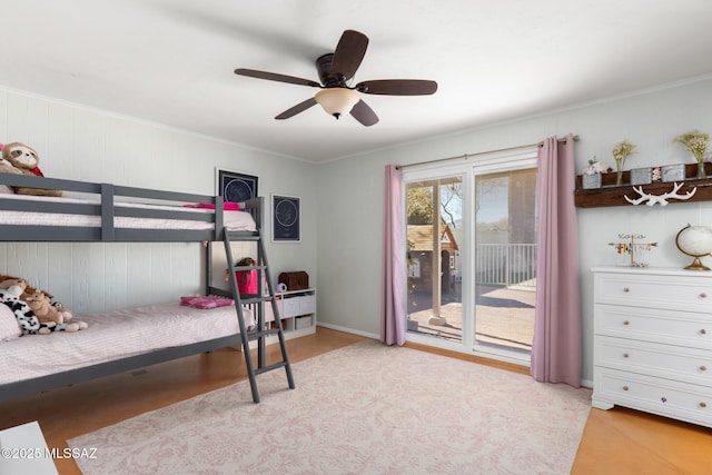 bedroom featuring crown molding, access to outside, and ceiling fan