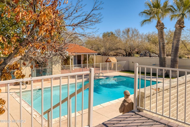 view of swimming pool with a patio