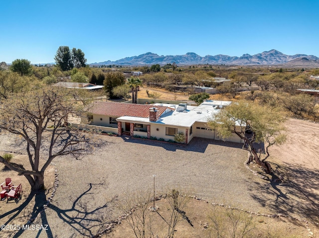 drone / aerial view featuring a mountain view