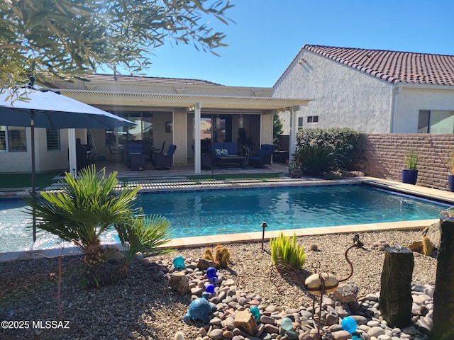 view of swimming pool featuring a patio