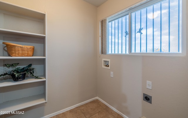 8497 E Hodgman Pl, Tucson, AZ 85747 - laundry room featuring hookup for an electric dryer, baseboards, washer hookup, and tile patterned flooring