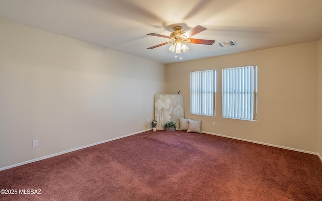 8497 E Hodgman Pl, Tucson, AZ 85747 - unfurnished room with a ceiling fan, carpet floors, and baseboards
