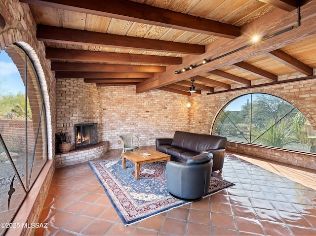 view of patio featuring an outdoor living space with a fireplace