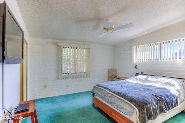 carpeted bedroom featuring vaulted ceiling, ceiling fan, and a textured ceiling