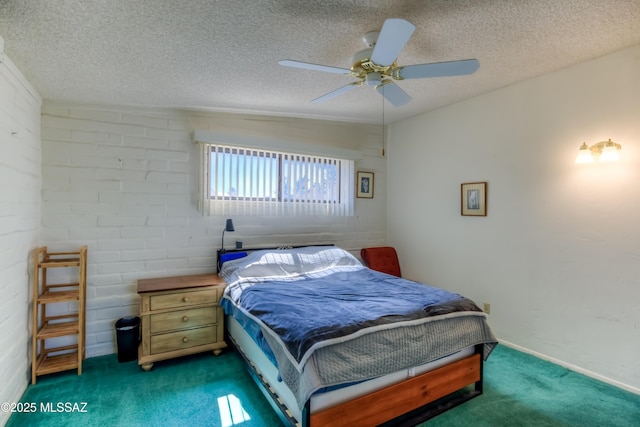 bedroom featuring a textured ceiling, ceiling fan, and carpet