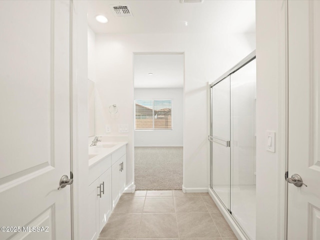 full bathroom with visible vents, recessed lighting, a shower stall, tile patterned flooring, and vanity