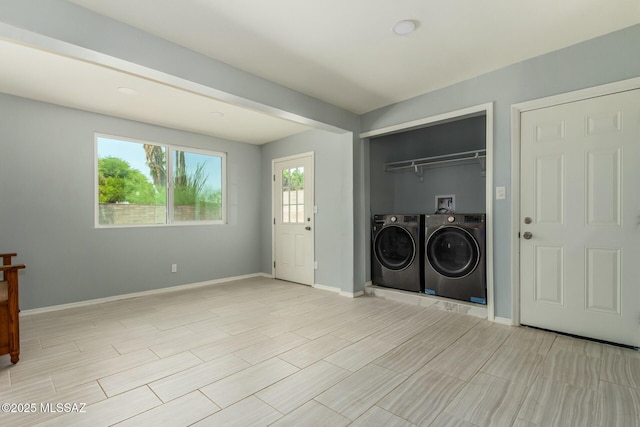 washroom featuring independent washer and dryer