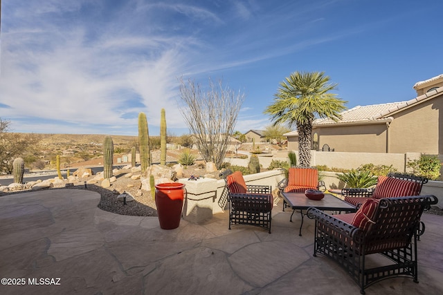 view of patio with fence