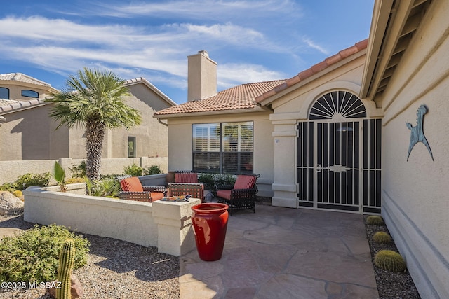 view of patio / terrace with a gate and fence