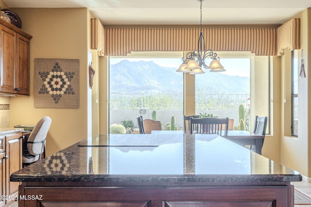 dining space featuring a notable chandelier