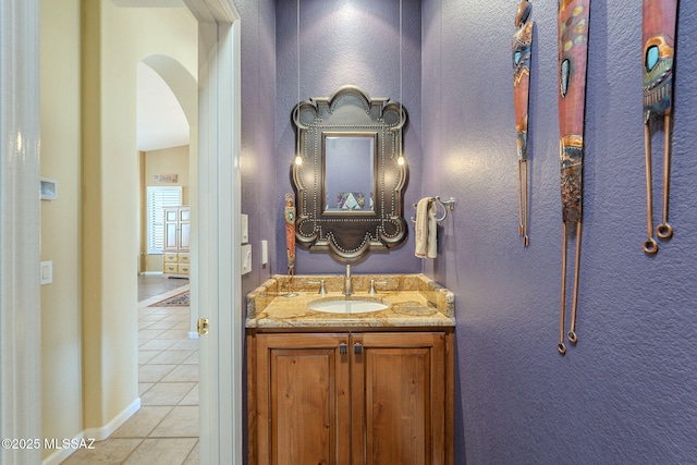 bathroom with vanity and tile patterned floors