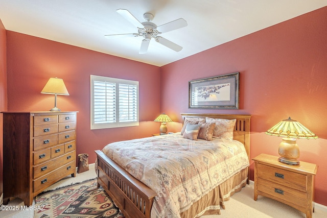 bedroom with carpet floors, baseboards, and a ceiling fan