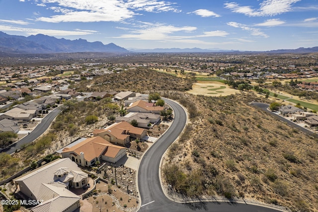 birds eye view of property with a mountain view and a residential view