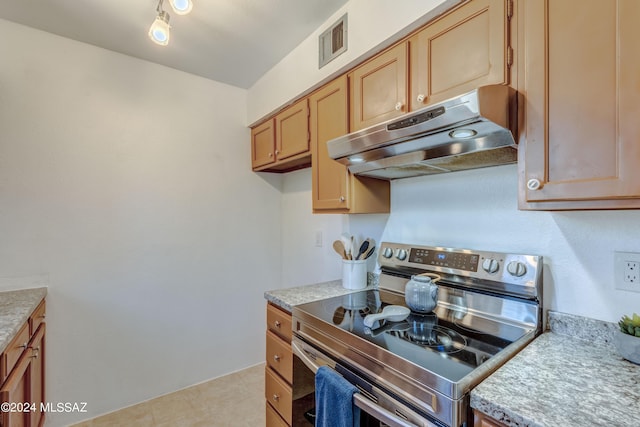 kitchen with stainless steel electric range