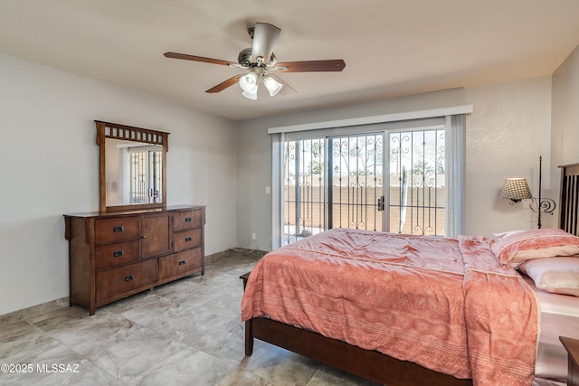 bedroom featuring ceiling fan and access to outside