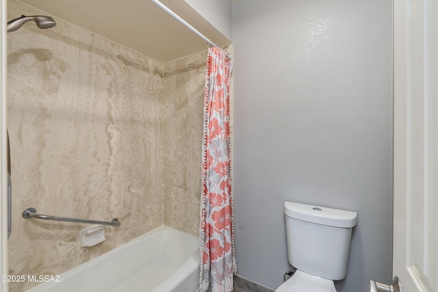 bathroom with shower / bath combo with shower curtain and toilet