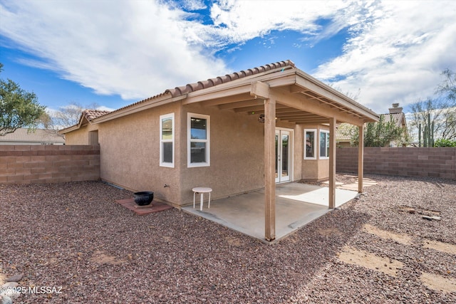 rear view of house featuring a patio area