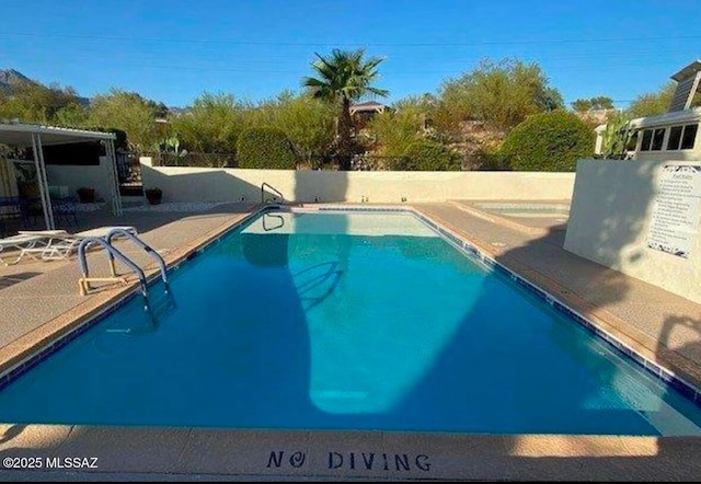 view of pool with a patio