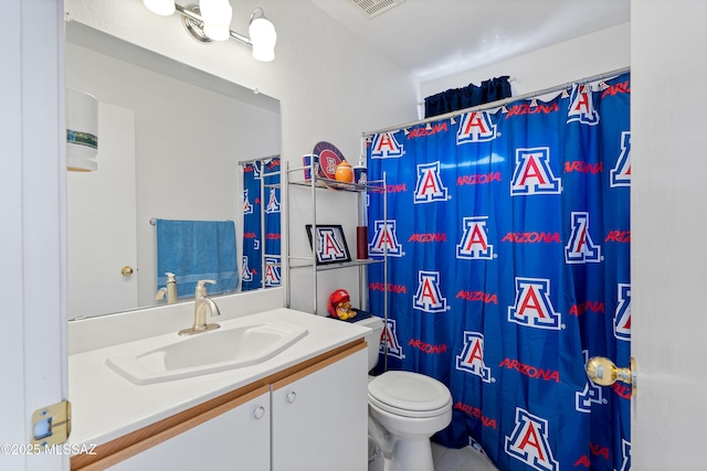 bathroom with tile patterned floors, vanity, toilet, and a shower with shower curtain