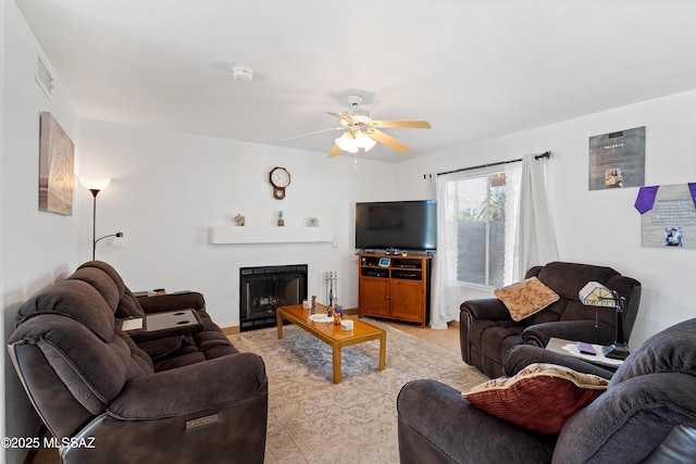 living room featuring ceiling fan