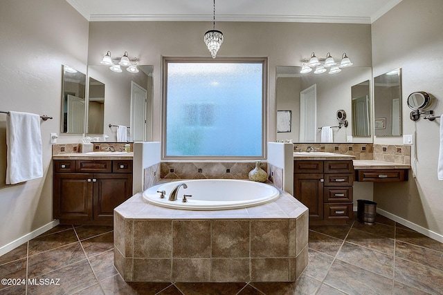 bathroom with crown molding, vanity, tasteful backsplash, and tiled tub