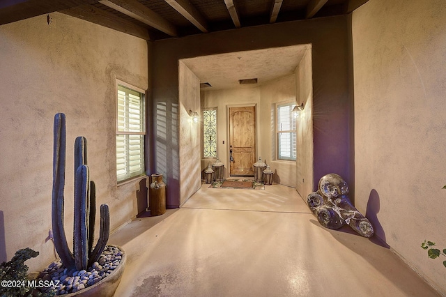 hallway featuring plenty of natural light