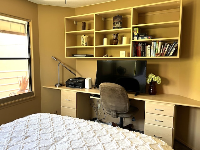 bedroom with built in desk