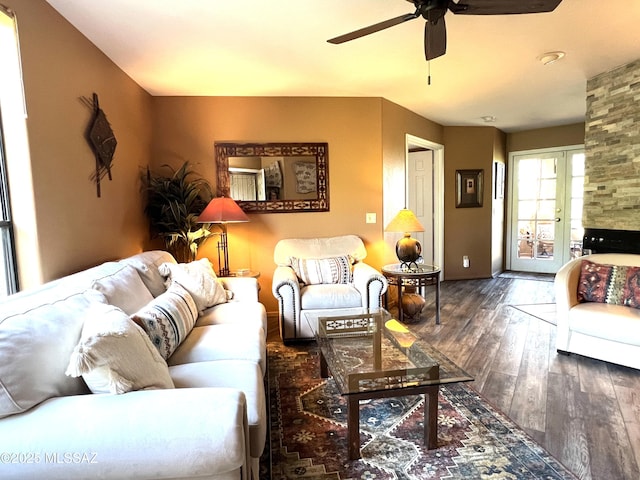 living room featuring french doors, ceiling fan, and dark hardwood / wood-style floors