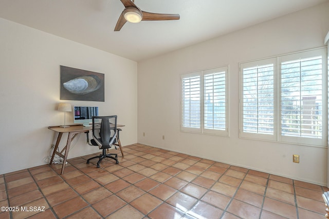 tiled office space with ceiling fan