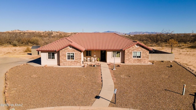 view of front of house featuring a patio