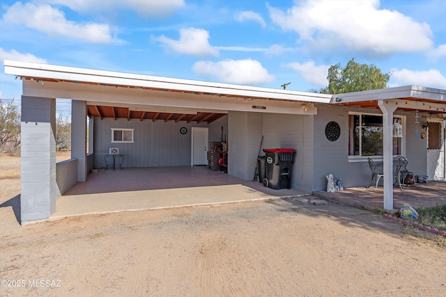 view of front of property with a carport