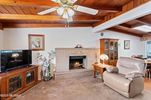 carpeted living room featuring wood ceiling, lofted ceiling with beams, and ceiling fan