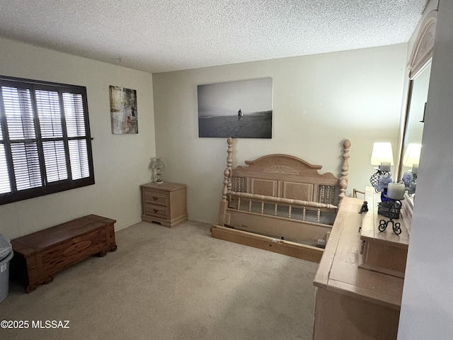 carpeted bedroom with a textured ceiling