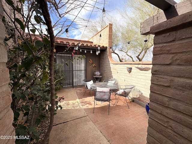 view of patio featuring outdoor dining space