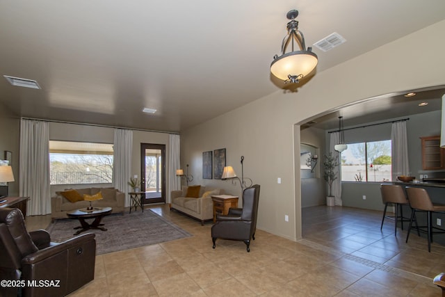 living room featuring light tile patterned flooring