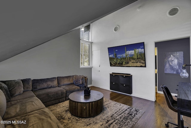 802 S 5th Ave, Tucson, AZ 85701 - living room with baseboards, visible vents, high vaulted ceiling, and wood finished floors