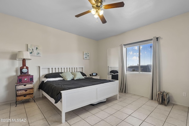 bedroom featuring light tile patterned floors and ceiling fan