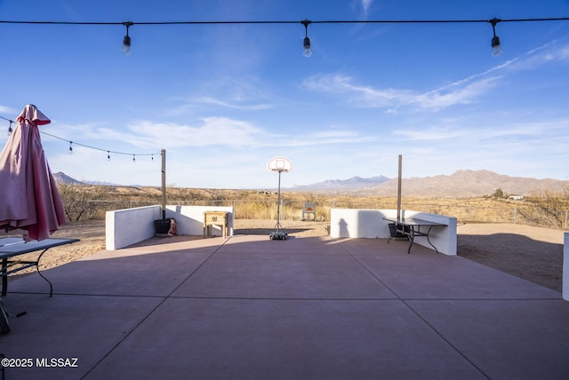 view of patio featuring a mountain view