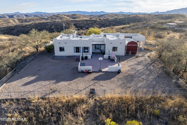 exterior space featuring a mountain view