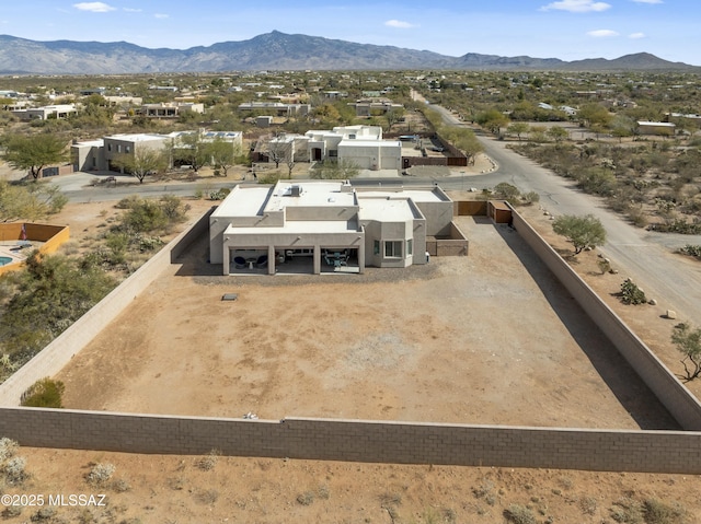 drone / aerial view featuring a mountain view