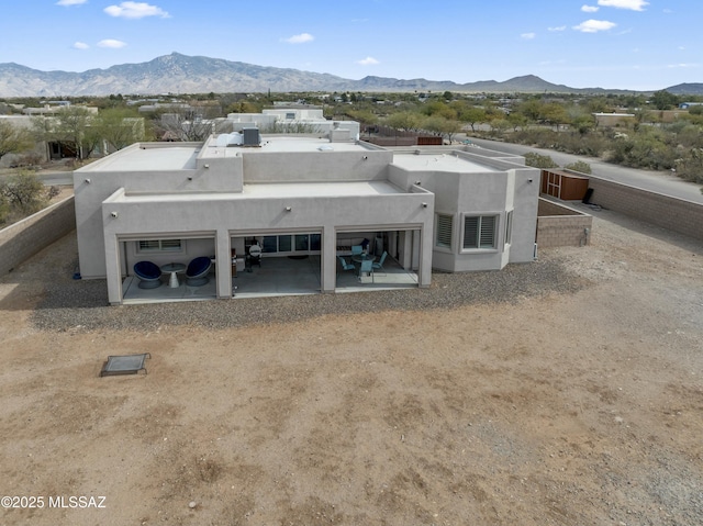 exterior space featuring a mountain view