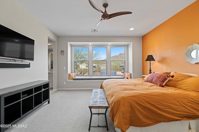 carpeted bedroom featuring ceiling fan