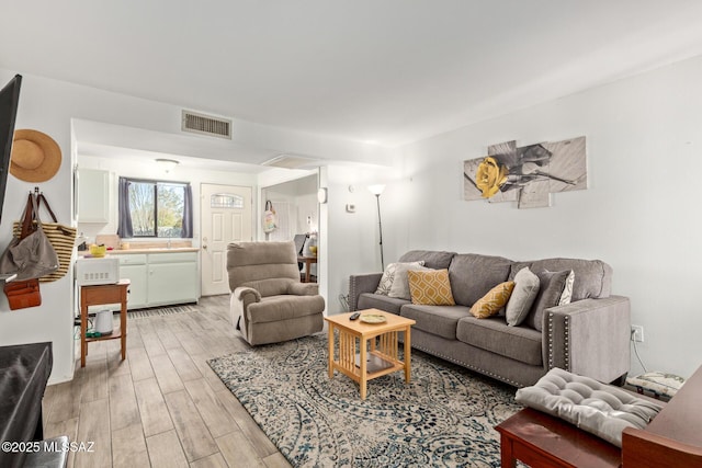 living room featuring light hardwood / wood-style flooring