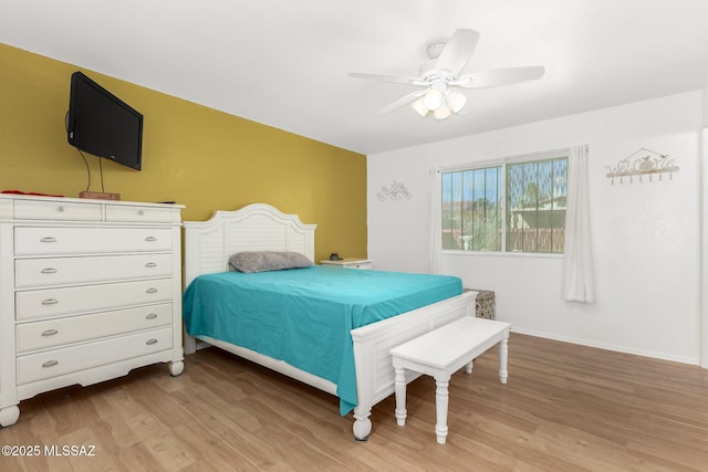 bedroom featuring ceiling fan and light hardwood / wood-style flooring