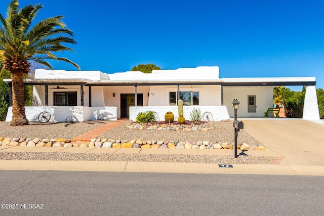 view of front of house featuring a carport